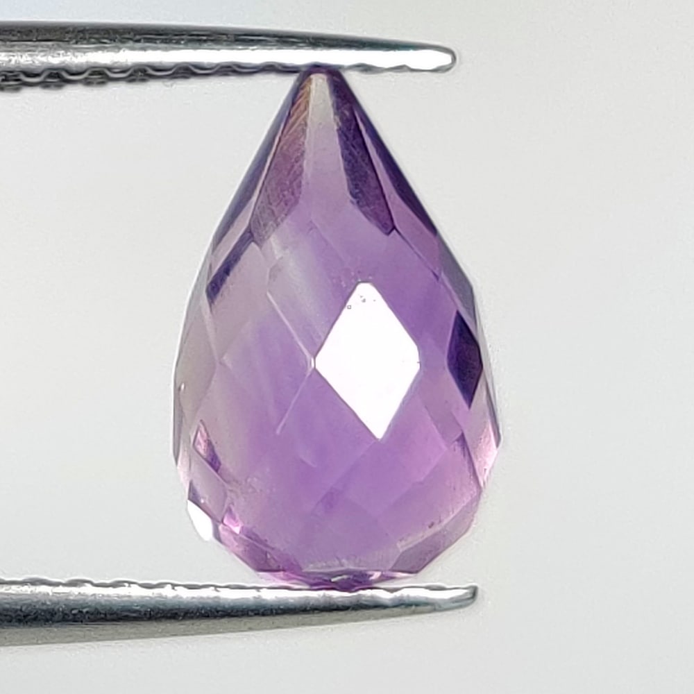 2.36 Ct Natural Purple Amethyst Pear Drop Beads: Weight - 2.36 Ct / Dimensions - 10.20 x 6.40 x 6.40 mm / Shape - Pear Drop Beads / Color - Purple / Clarity - VVS / Origin -Brazil / Treatment - Heated