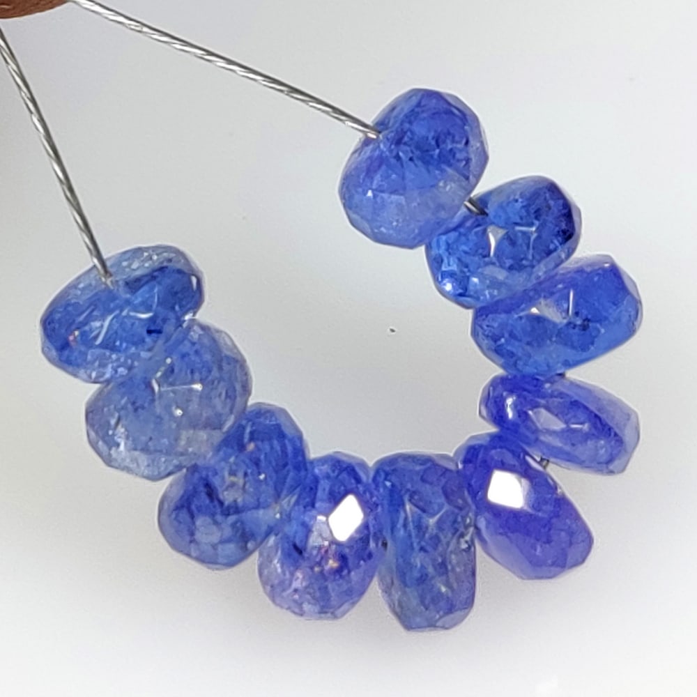 6.63 Ct Natural Tanzanite Round cut Beads: Weight - 6.63 Ct / Dimensions - 4.90 - 5.20 mm / 10 Pc's / Shape & Cut - Round Cut beads / Transparency - Transparent / Origin - Tanzania / Comments - Standard Heated