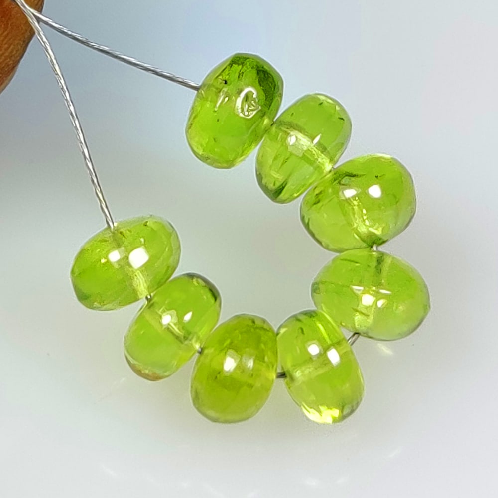 8.36 Ct Natural Green Peridot Round Beads: Weight - 8.36 Ct / Size - 5.50 - 5.70 mm / 8 Pc's / Shape - Round Beads / Color - Green / Clarity - VVS / Origin - Pakistan / Treatment - None