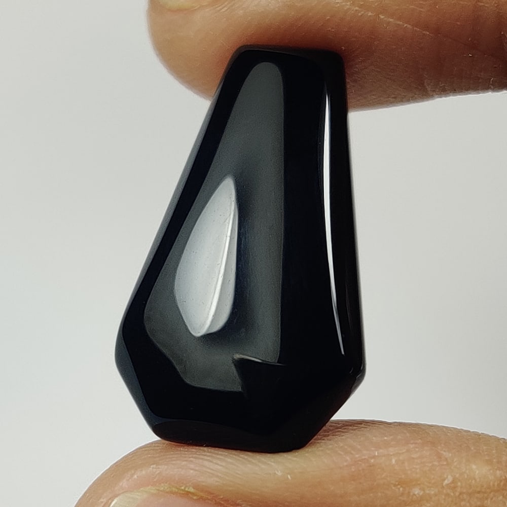 9.46 Ct Natural Black Onyx Fancy Cab: Weight - 9.46 Ct / Dimensions - 24.00 x 12.70 x 4.60 mm / Shape - Fancy Cab / Clarity - Opaque / Origin - Brazil / Treatment - None