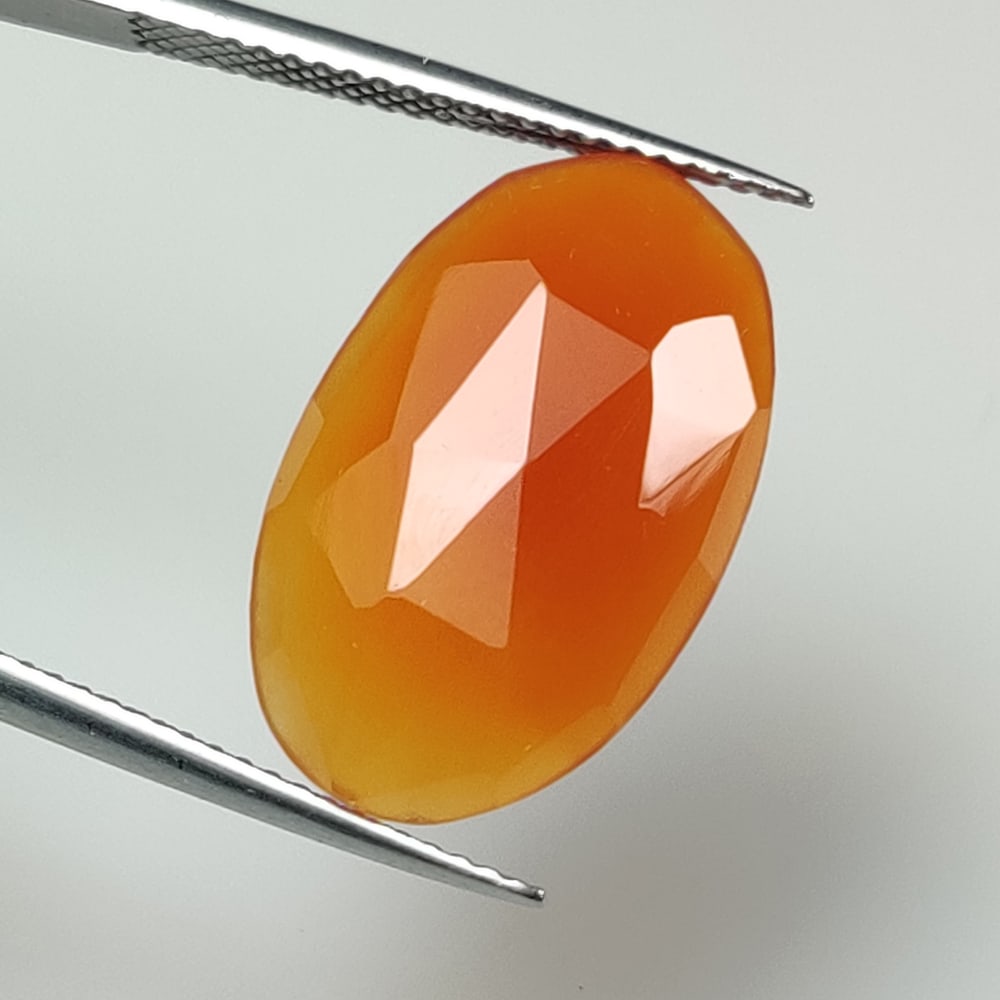 6.82 Ct Natural Orange Carnelian Oval Cut: Weight - 6.82 Ct / Dimensions - 20.00 x 12.20 x 4.10 mm / Shape & Cut - OVal Cut / Transparency - Semi - Opaque / Origin - Brazil