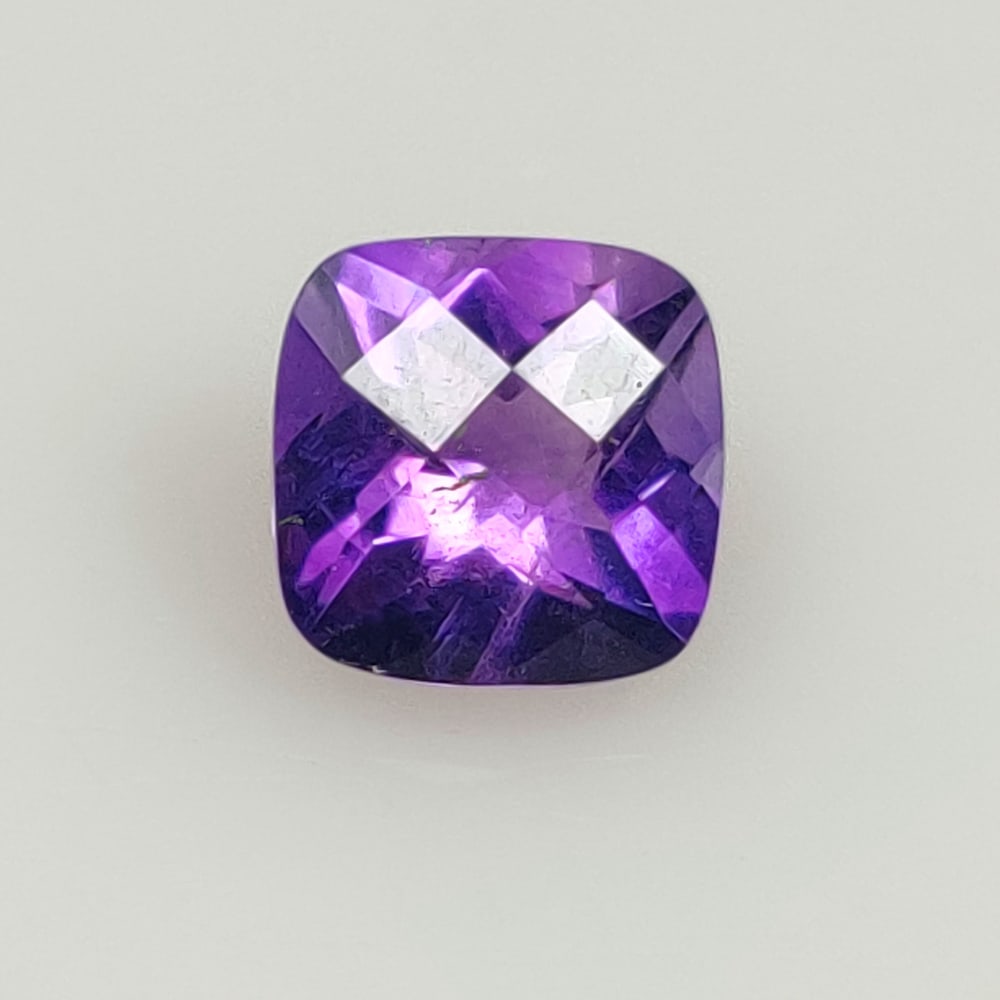 2.01 Ct Natural Purple Amethyst Cushion Cut: Weight - 2.01 Ct / Size - 8.00 x 7.90 x 5.50 mm / Shape - Cushion Cut / Color - Purple / Clarity - VVS / Origin - Brazil / Treatment - Heated