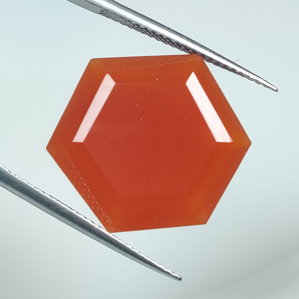 15.46 Ct Natural Orange Carnelian Hexagon Cut: Weight -15.46 Ct / Dimensions -20.60 x 17.50 x 7.30 mm / Shape & Cut - Hexagon Cut / Transparency - Semi - Opaque / Origin - Brazil
