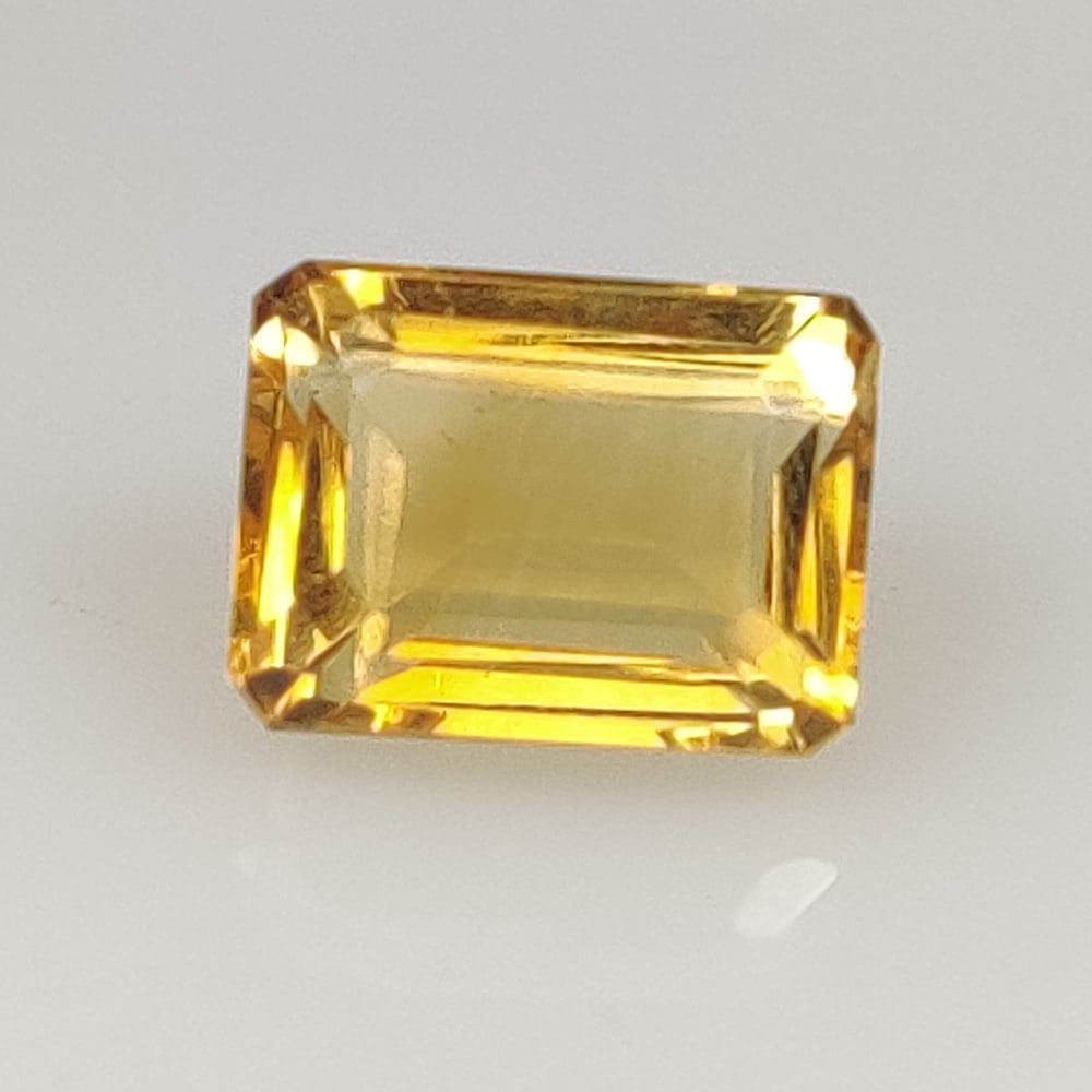 4.32 Ct Natural Yellow Citrine Octagon Cut: Weight - 4.32 Ct / Size - 10.60 x 8.00 x 6.10 mm / Shape - Octagon Cut / Color - Yellow / Clarity - VVS / Origin - Brazil / Treatment - Heated