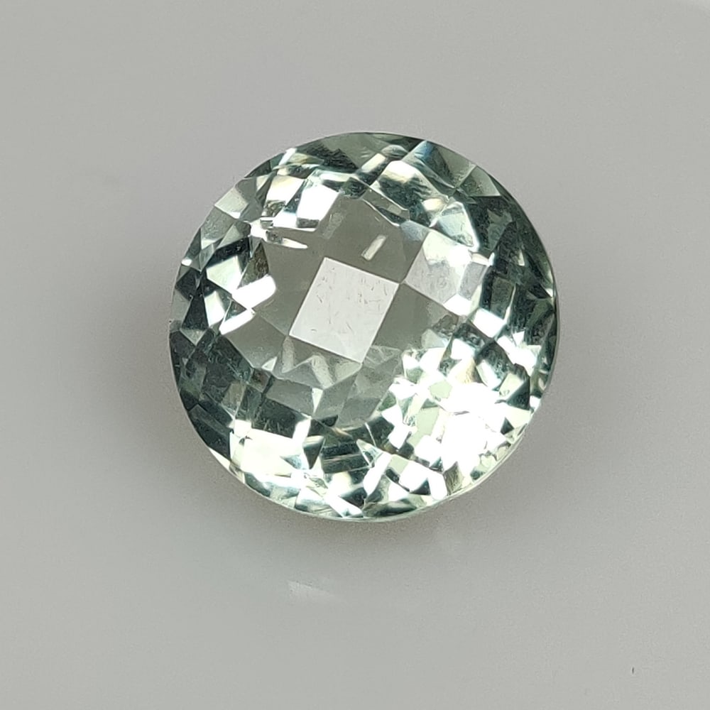 12.25 Ct Natural Green Amethyst Round Cut: Weight - 12.25 Ct / Dimensions - 14.90 x 14.90 x 10.50 mm / Shape - Round Cut / Color - Green / Origin - Brazil / Treatment - Heated