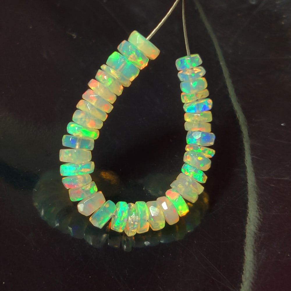 3.86 Ct Natural 36 Multicolor Fire Opal Round Beads: Weight - 3.86 Ct / Dimensions - 3.40 - 4.10 mm / 36 Pc's / Shape - Round Beads / Transparency - Transparent / Origin - Ethiopia / Treatment - None