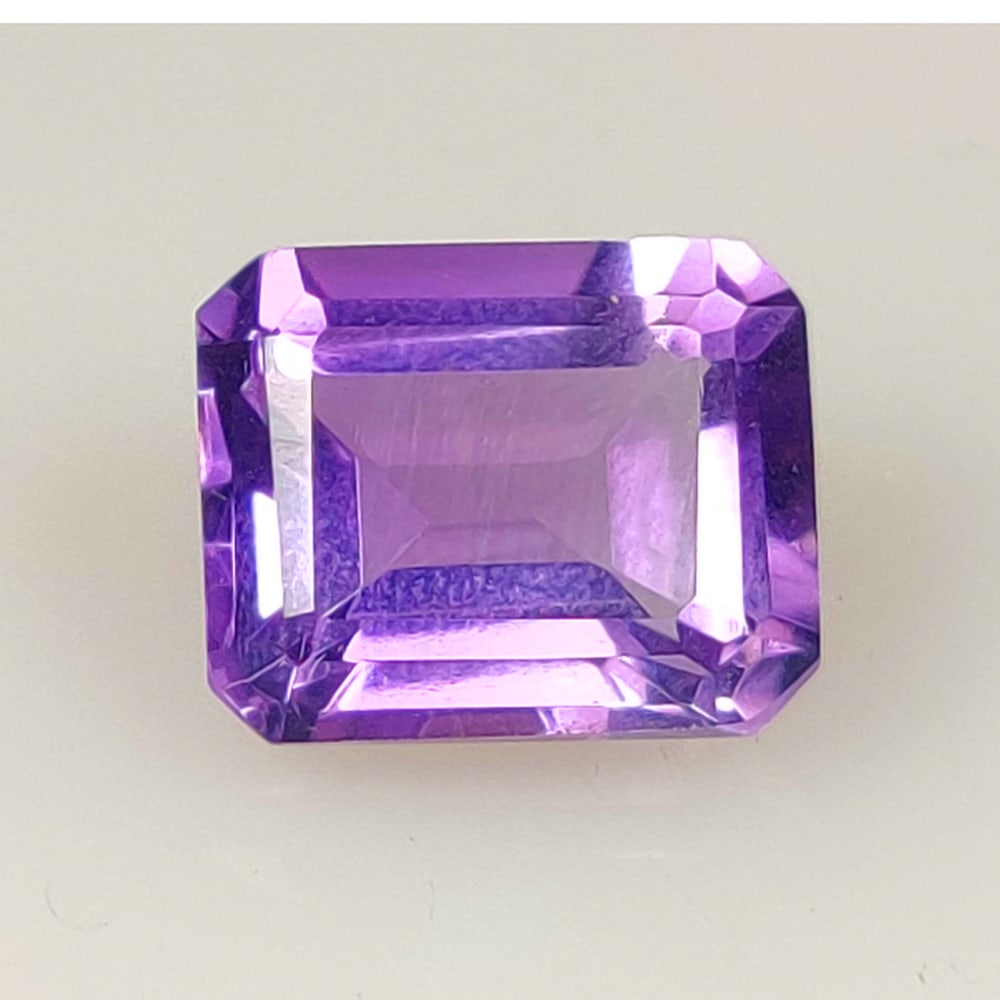 4.71 Ct Natural Purple Amethyst Octagon Cut: Weight - 4.71 Ct / Size - 10.90 x 8.90 x 6.50 mm / Shape - Octagon Cut / Color - Purple / Clarity - VVS / Origin - Brazil / Treatment - Heated