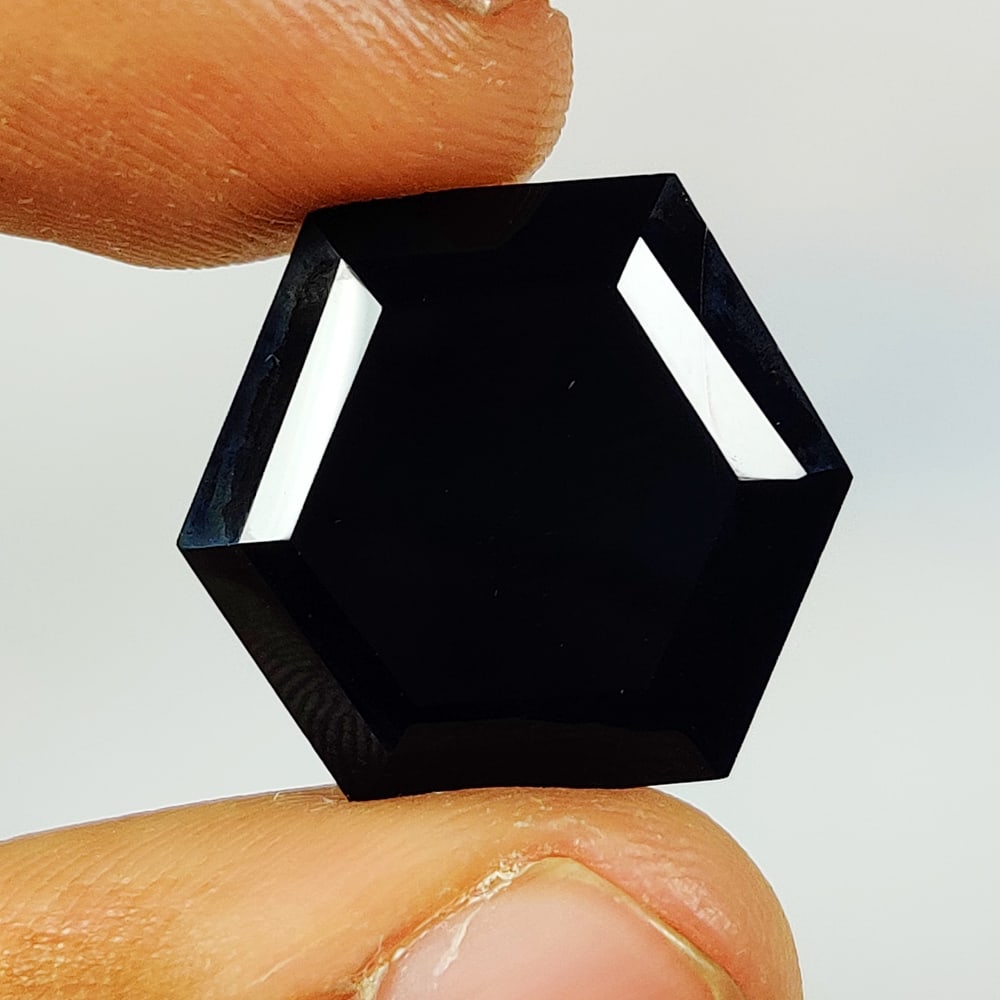 15.91 Ct Natural Black Onyx Hexagon Cut: Weight - 15.91 Ct / Dimensions - 22.00 x 18.40 x 7.10 mm / Shape - Hexagon Cut / Color - Black / Clarity - OPaque / Origin - Brazil / Treatment - None