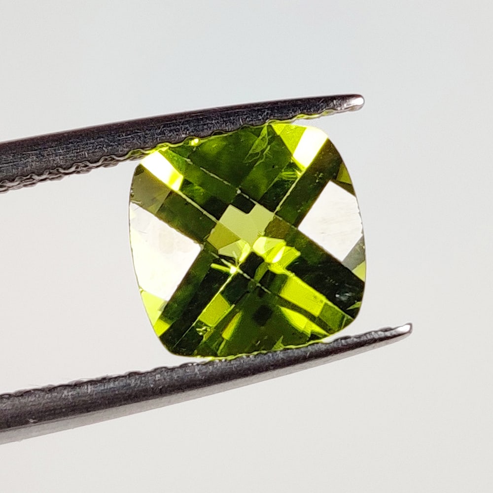 1.42 Ct Natural Green Peridot Cushion Cut: Weight - 1.42 Ct / Dimensions - 7.10 x 7.00 x 4.40 mm / Shape - Cushion Cut / Color - Green / Clarity - VVS / Origin - Pakistan / Treatment - None
