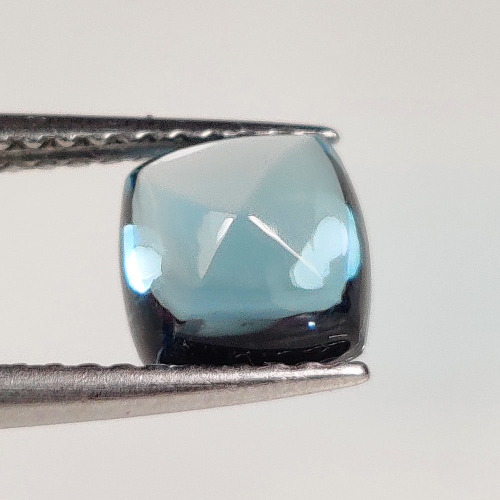 1.85 Ct Natural London Blue Topaz Cushion Cab: Weight - 1.85 Ct / Dimensions - 6.60 x 6.50 x 4.70 mm / Shape - Cushion Cab / Color - Blue / Clarity - VVS / Origin - Brazil / Treatment - Irradiated