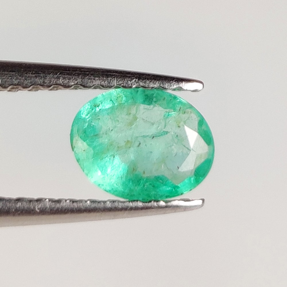 0.43 Ct Natural Zambian Green Emerald Oval Cut: Weight - 0.43 Ct / Dimensions - 6.20 x 4.80 x 2.50 mm / Shape - Oval Cut / Color - Green / Clarity - SI / Origin - Zambia / Treatment - Natural Emeralds are commonly enhanced by oil