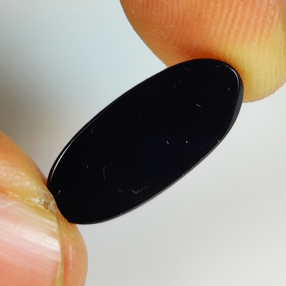4.45 Ct Natural Black Onyx Oval Cab: Weight - 4.45 Ct / Size - 18.10 x 8.20 x 3.10 mm / Shape - Oval Cab / Clarity - Opaque / Origin - Brazil / Treatment - None
