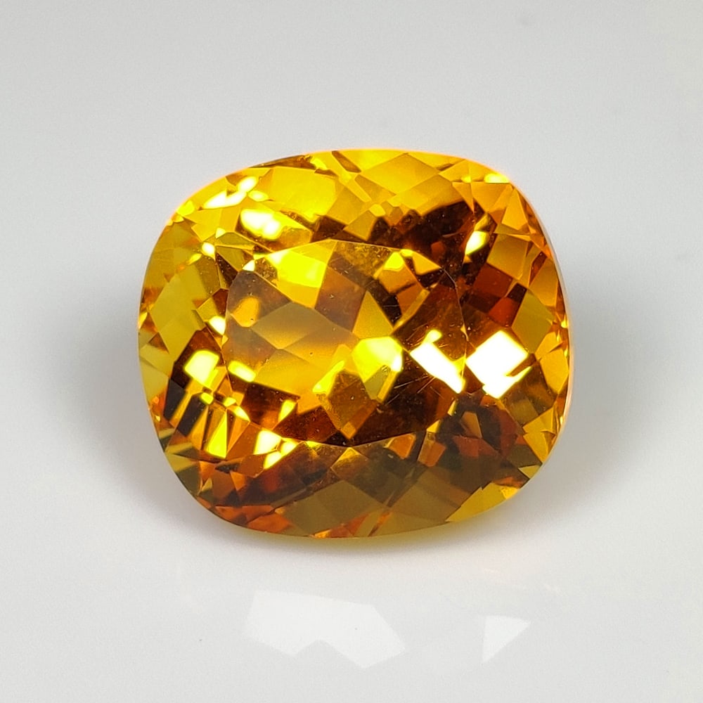 13.59 Ct Natural Yellow Citrine Cushion Cut: Weight - 13.59 Ct / Dimensions - 15.00 x 13.00 x 11.50 mm / Shape - Cushion Cut / Color - Yellow / Clarity - VVS / Origin - Brazil / Treatment - Heated