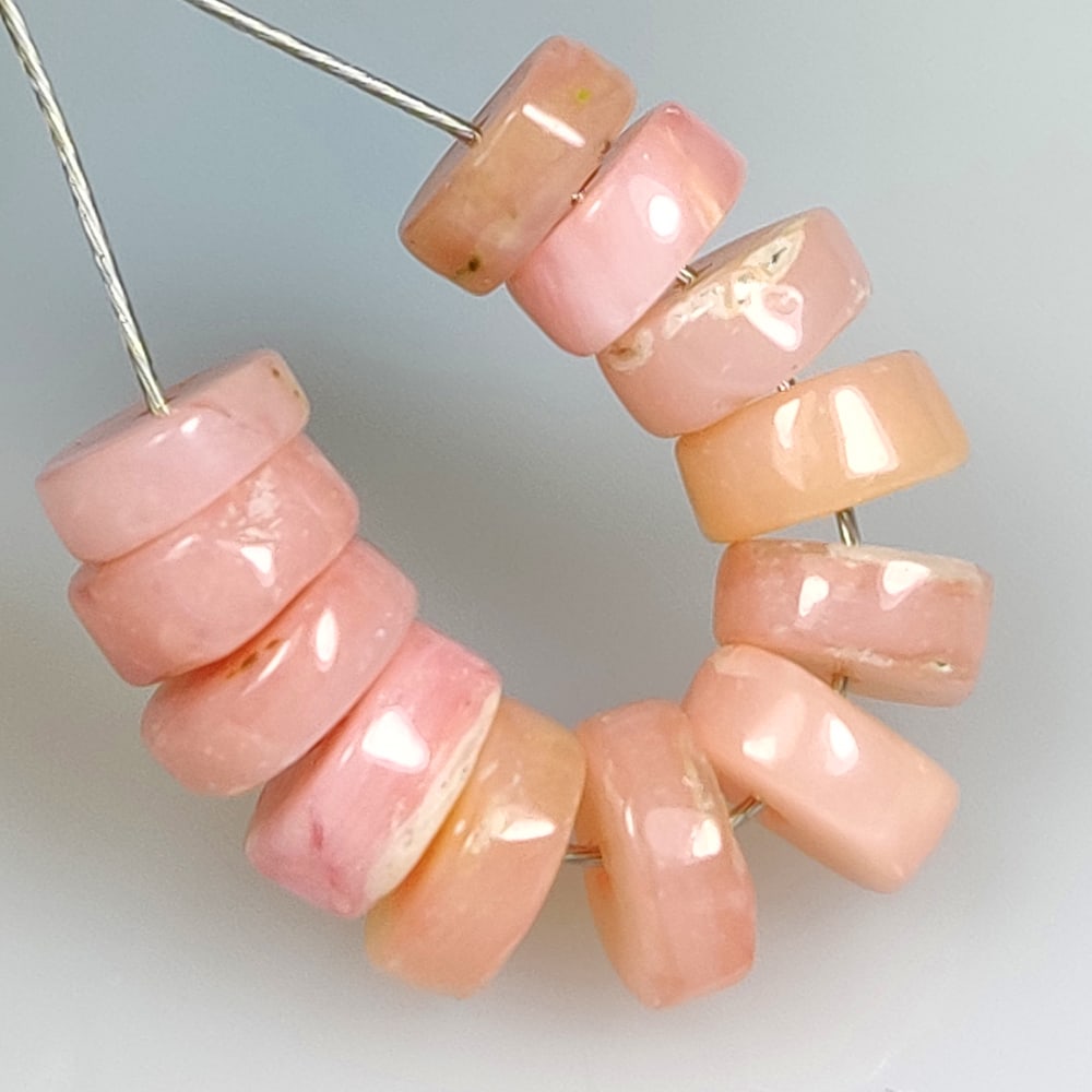 11.11 Ct Natural Pink Opal Round Beads: Weight - 11.11 Ct / Dimensions - 6.50 - 6.90 mm / 12 Pc's/ Shape - Round Beads / Clarity - Opaque / Origin - Peru / Treatment - None