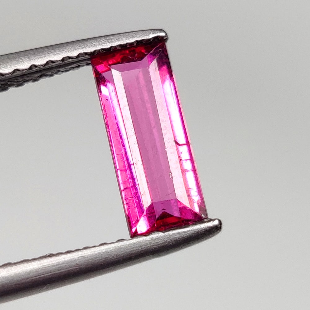 1.03 Ct Natural Pink Tourmaline Octagon Cut: Weight - 1.03 Ct / Size - 10.00 x 4.30 x 3.30 mm / Shape - OCtagon Cut / Color - Pink / Clarity - VVS / Origin - Mozambique / Treatment - None
