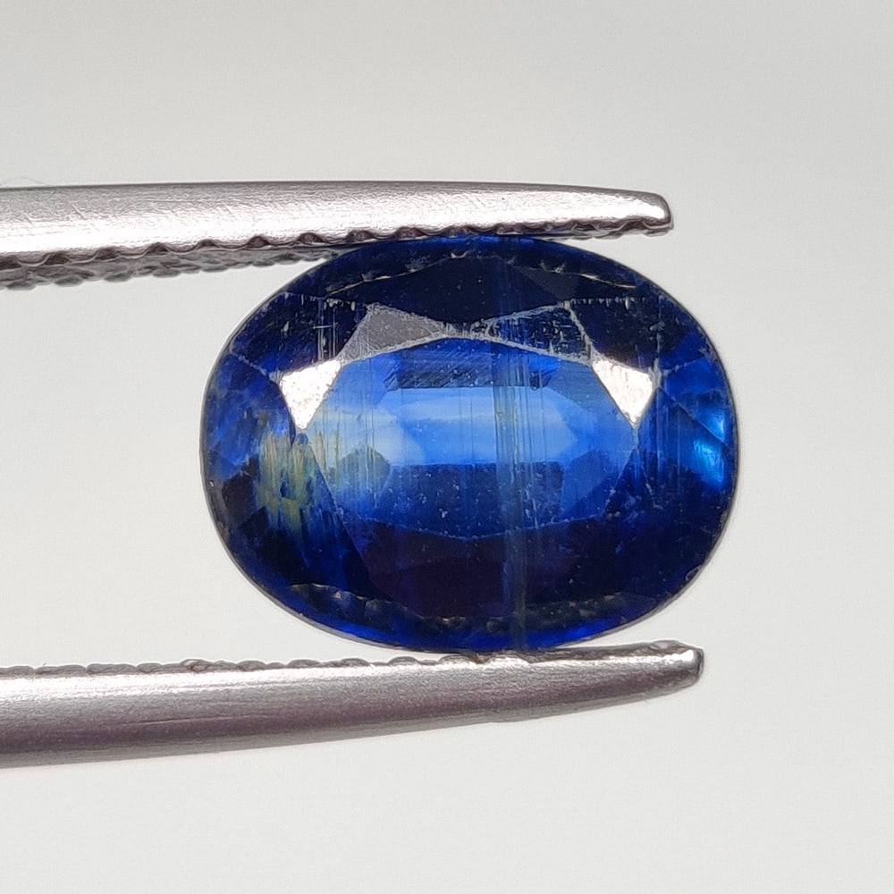 2.50 Ct Natural Blue Kyanite OVal Cut: Weight - 2.50 Ct / Size - 9.40 x 7.40 x 4.50 mm / Shape - Oval Cut / Color - Deep Blue / Clarity - Transparent / Origin - India / Treatment - None