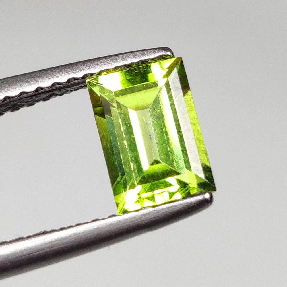 1.15 Ct Natural Green Peridot Octagon Cut: Weight - 1.15 Ct / Dimensions - 7.40 x 5.40 x 3.80 mm / Shape - Octagon Cut / Color - Green / Clarity - VVS / Origin - Pakistan / Treatment - None