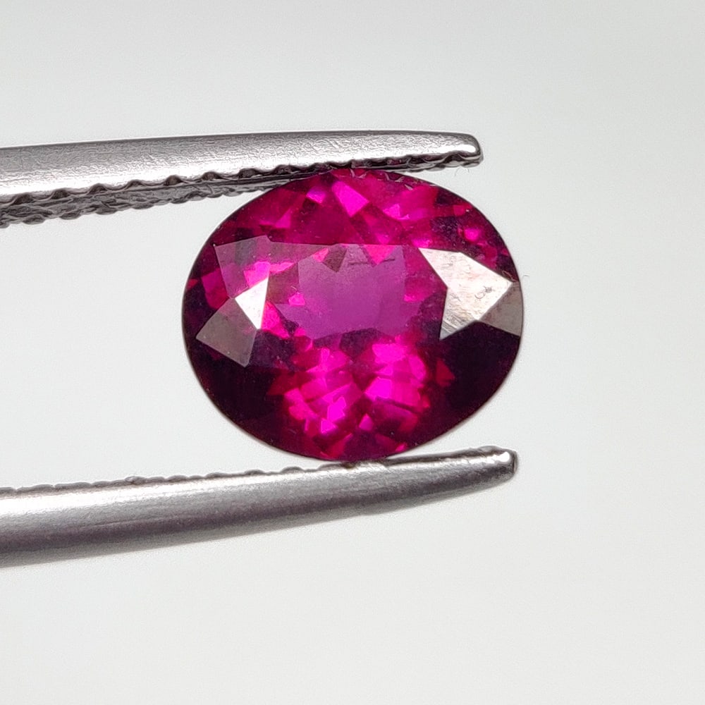 1.82 Ct Natural Rhodolite Garnet Oval Cut: Weight - 1.82 Ct / Dimensions - 7.80 x 6.70 x 4.30 mm / Shape - Oval Cut / Clarity - VVS / Origin - Nigeria / Treatment - None
