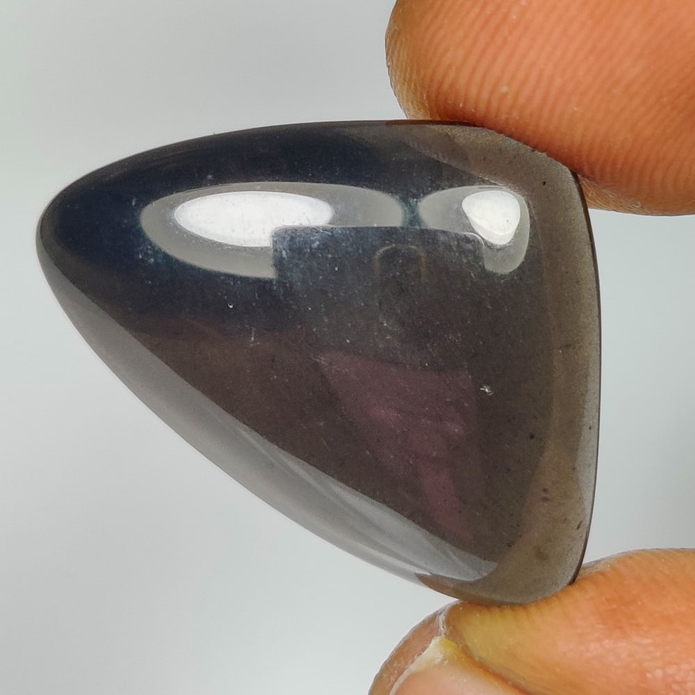 14.72 Ct Natural Onyx Fancy Cab: Weight - 14.72 Ct / Size - 25.00 x 17.80 x 5.70 mm / Shape - Fancy Cab / Clarity - Transparent / Origin - Brazil / Treatment - None