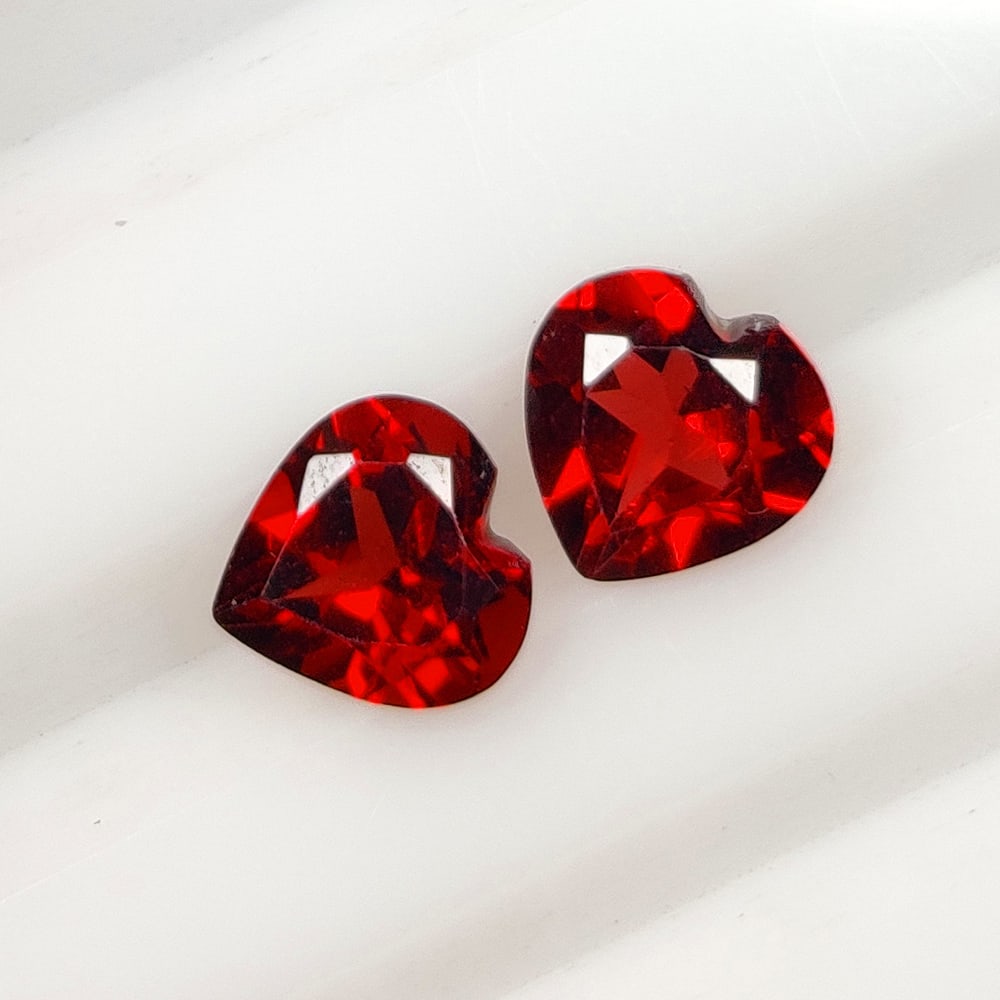 1.81 Ct Natural Almandite Garnet Heart Cut Pair: Weight - 1.81 Ct / Dimensions - 6.20 x 6.20 x 3.70 mm / 2 Pc's / Shape - Heart Cut / Clarity - VVS / Origin - Nigeria / Treatment - None
