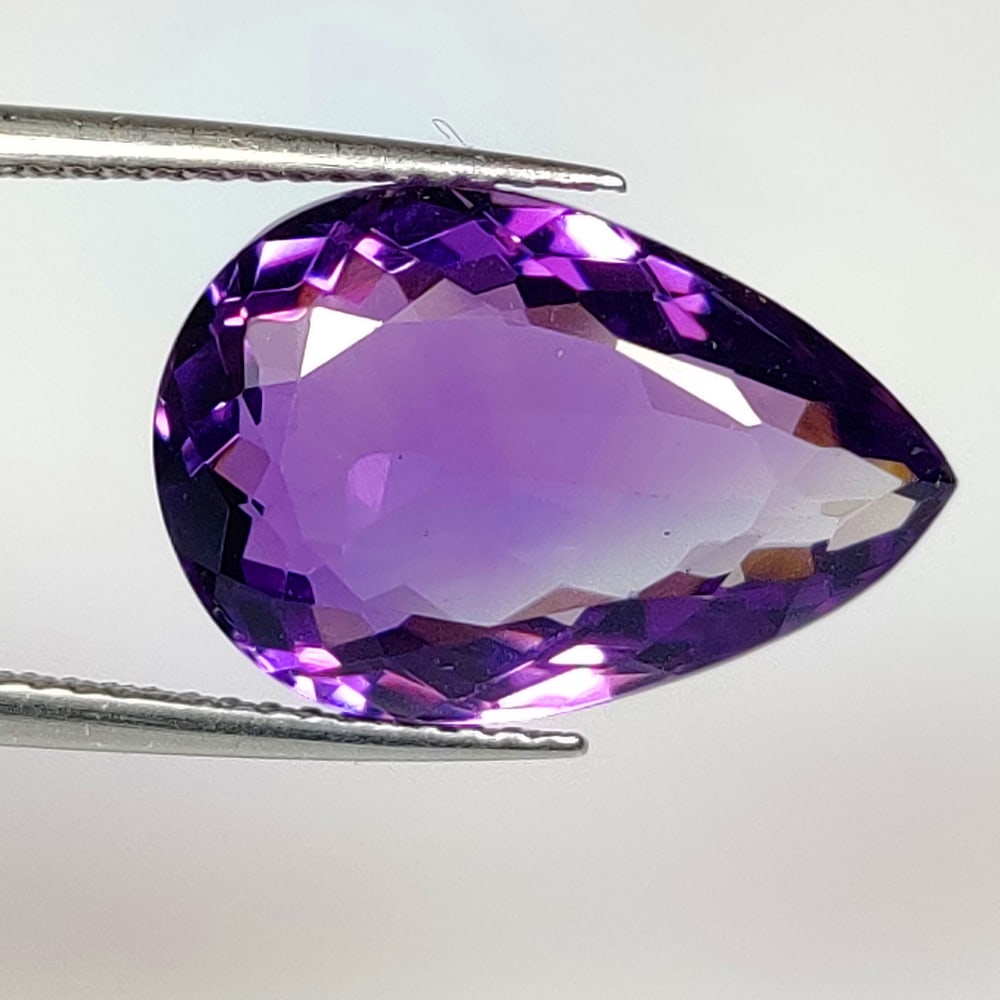 9.03 Ct Natural Purple Amethyst Pear cut: Weight - 9.03 Ct / Dimensions - 16.70 x 11.30 x 8.00 mm / Shape - Pear cut / Color - Purple / Clarity - VVS / Origin - Brazil / Treatment - Heated