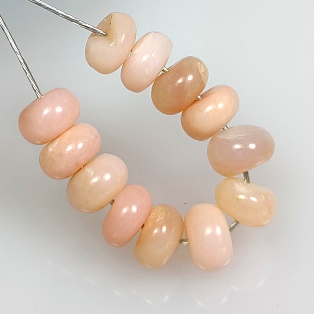 6.08 Ct Natural Pink Opal Round Beads: Weight - 6.08 Ct / Dimensions - 5.10 - 5.30 mm / 12 Pc's / Shape - Round Beads / Clarity - Opaque / Origin - Peru / Treatment - None