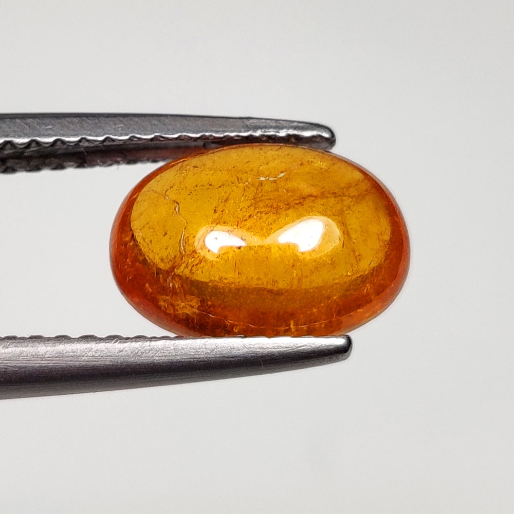 3.41 Ct Natural Deep Orange Spessarite Garnet Oval Cab: Weight - 3.41 Ct / Size - 10.00 x 7.20 x 4.30 mm / Shape - Oval Cab / Clarity - SI / Origin - Madagascar / Treatment - None