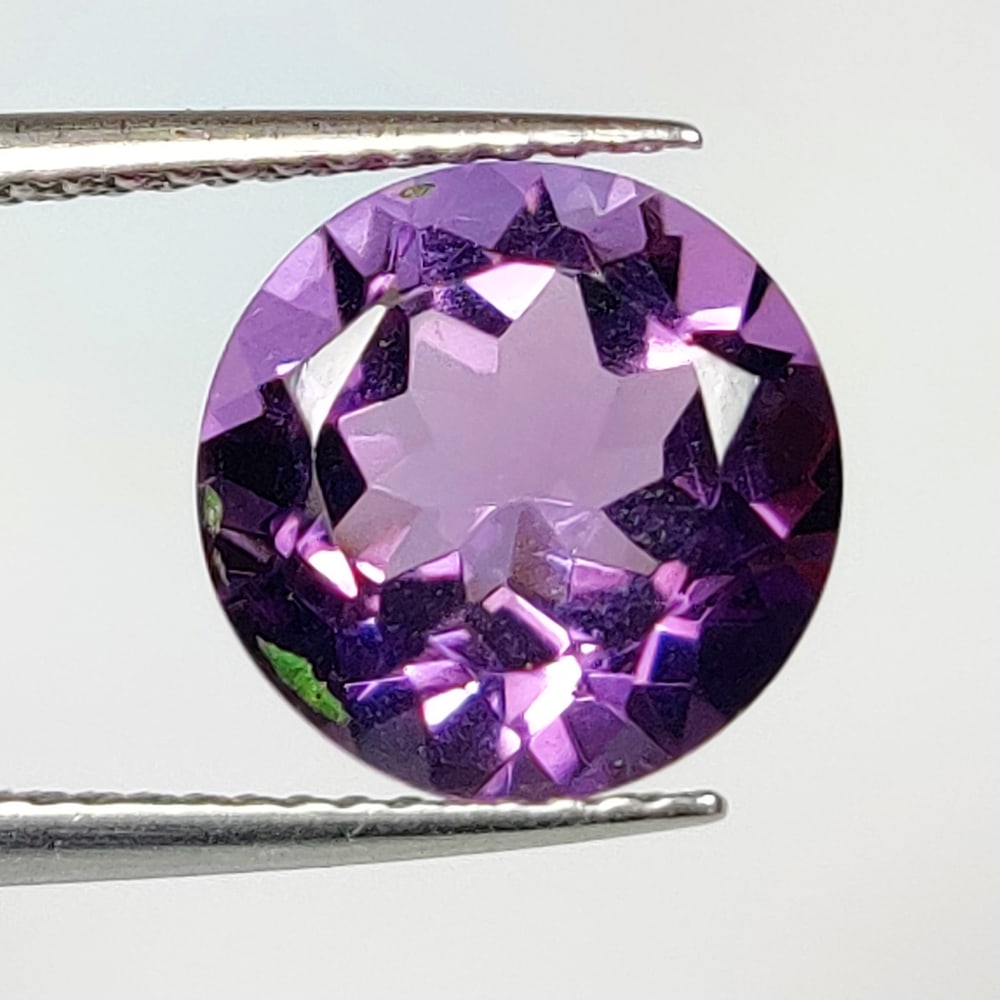 3.47 Ct Natural Purple Amethyst Round cut: Weight - 3.47 Ct / Dimensions - 10.10 x 10.10 x 6.50 mm / Shape - Round cut / Color - Purple / Clarity - VVS / Origin - Brazil / Treatment - Heated