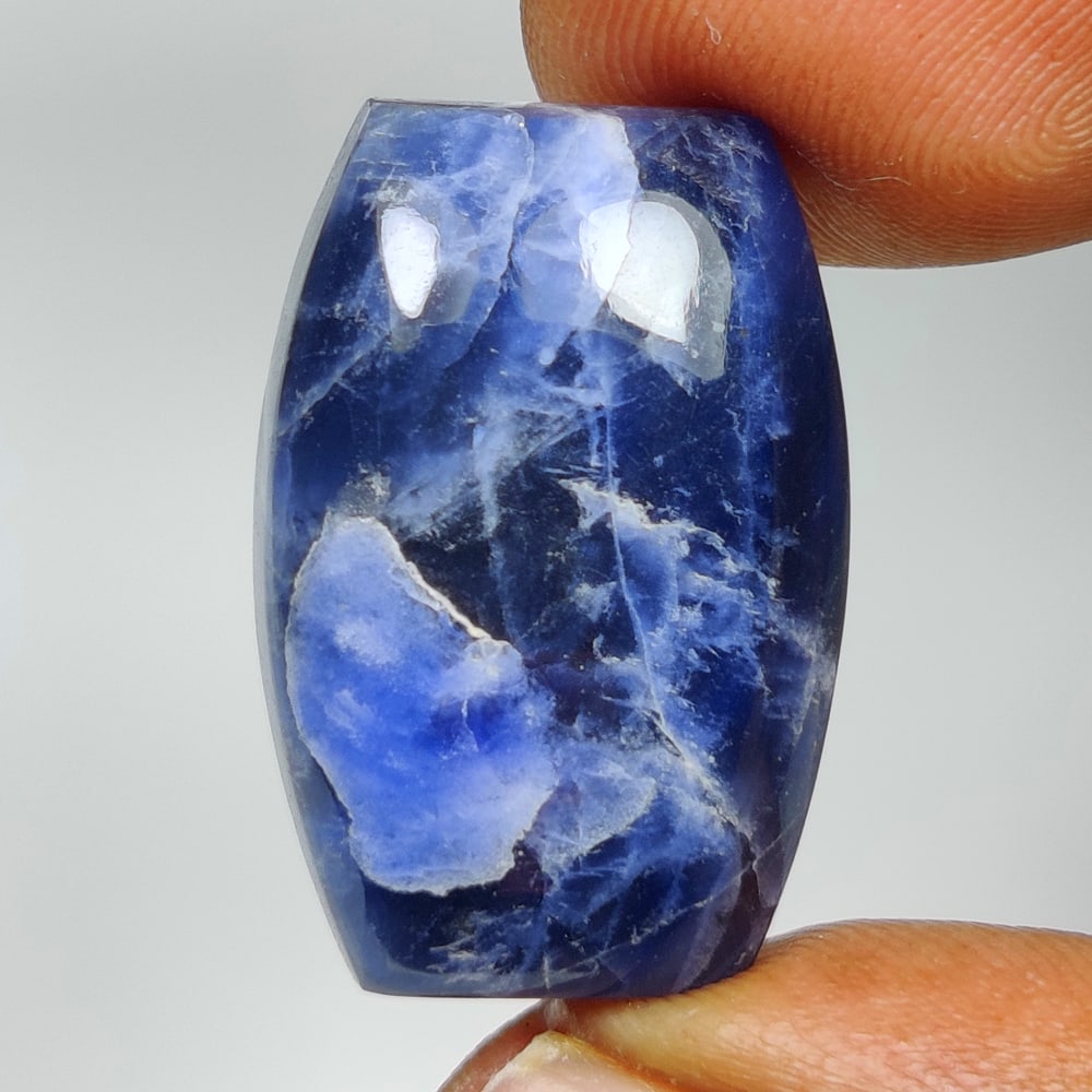 18.17 Ct Natural Sodalite Fancy Cab: Weight - 18.17 Ct / Size - 23.00 x 15.80 x 6.30 mm / Shape - Fancy Cabochon / Color - Blue / Clarity - Opaque / Origin -Brazil / Treatment - None