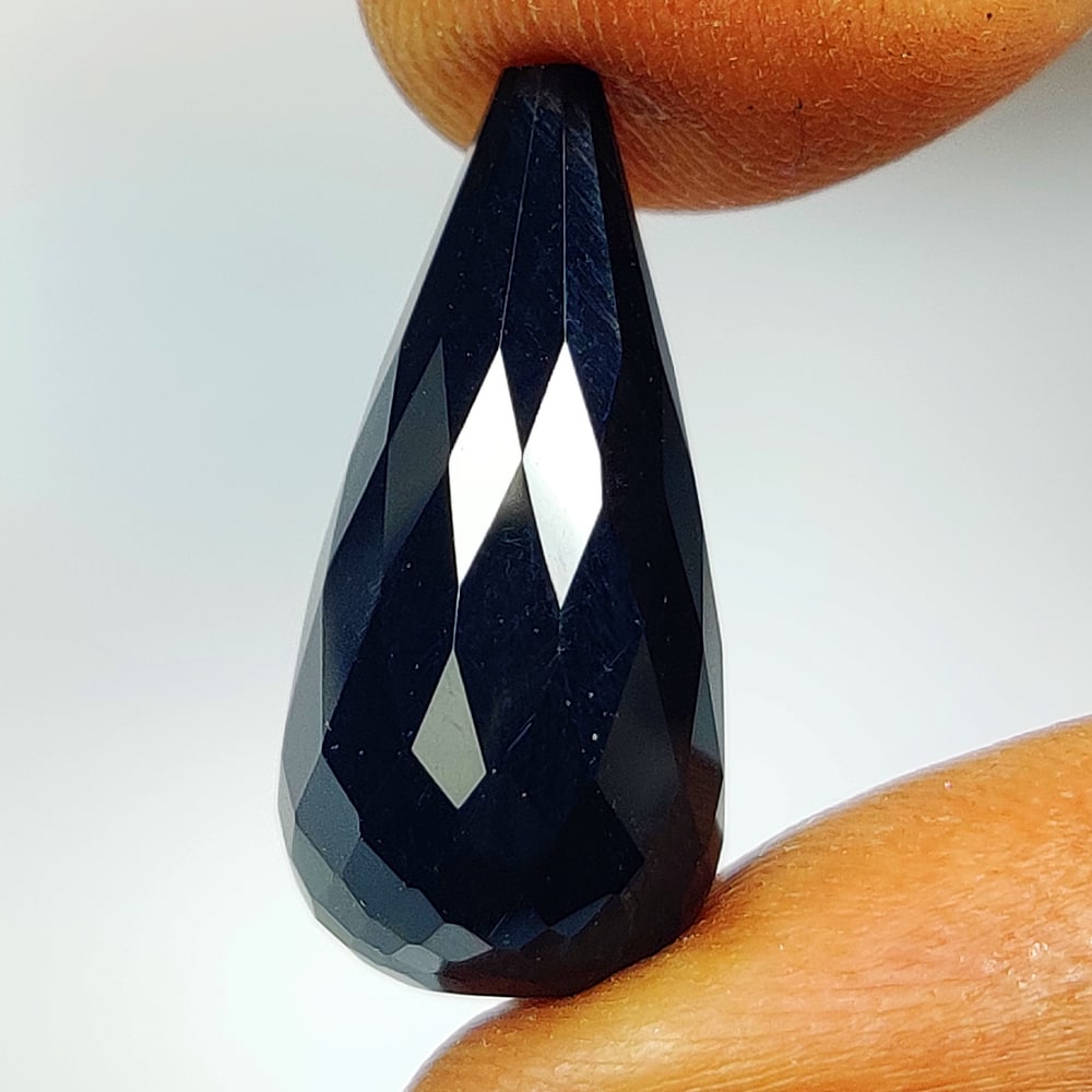 10.97 Ct Natural Black Onyx Fancy Pear Drop: Weight - 10.97 Ct / Dimensions -20.20 x 9.60 x 9.60 mm / Shape - Fancy Pear Drop / Clarity - Opaque / Origin - Brazil / Comments - None