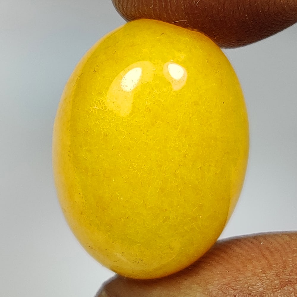 18.25 Ct Natural Yellow Quartz Oval Cab: Weight - 18.25 Ct / Dimensions - 20.30 x 15.10 x 8.00 mm / Shape - Oval Cab / Clarity - Opaque / Origin - Brazil / Treatment - None