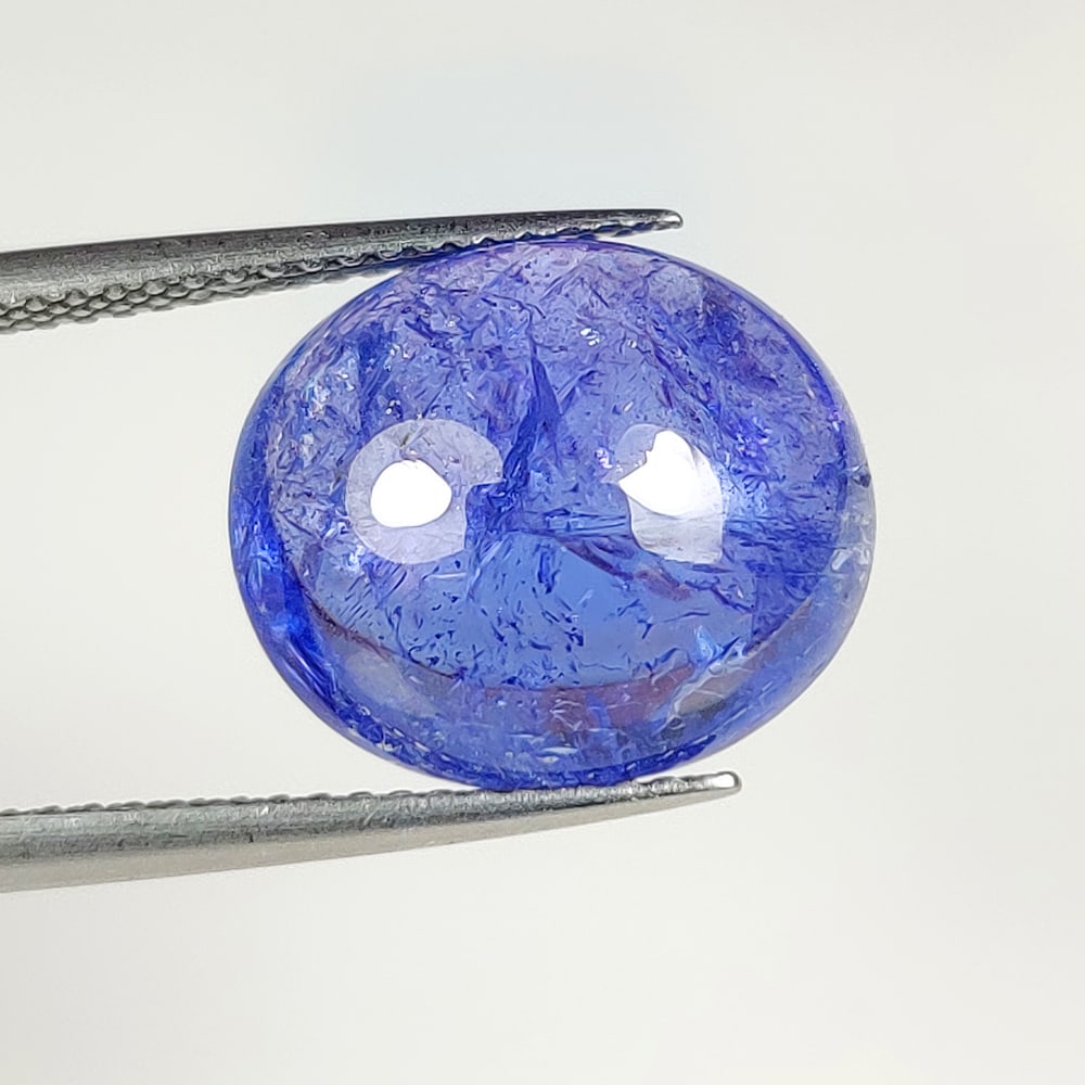 9.51 Ct Natural Tanzanite Oval Cab (1 of 2)