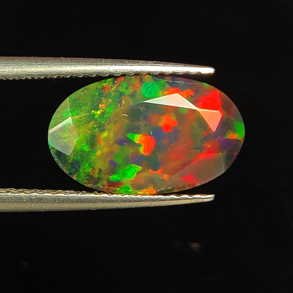 2.44 Ct Natural Black Flashing Fire Opal Oval Cut (1 of 3)