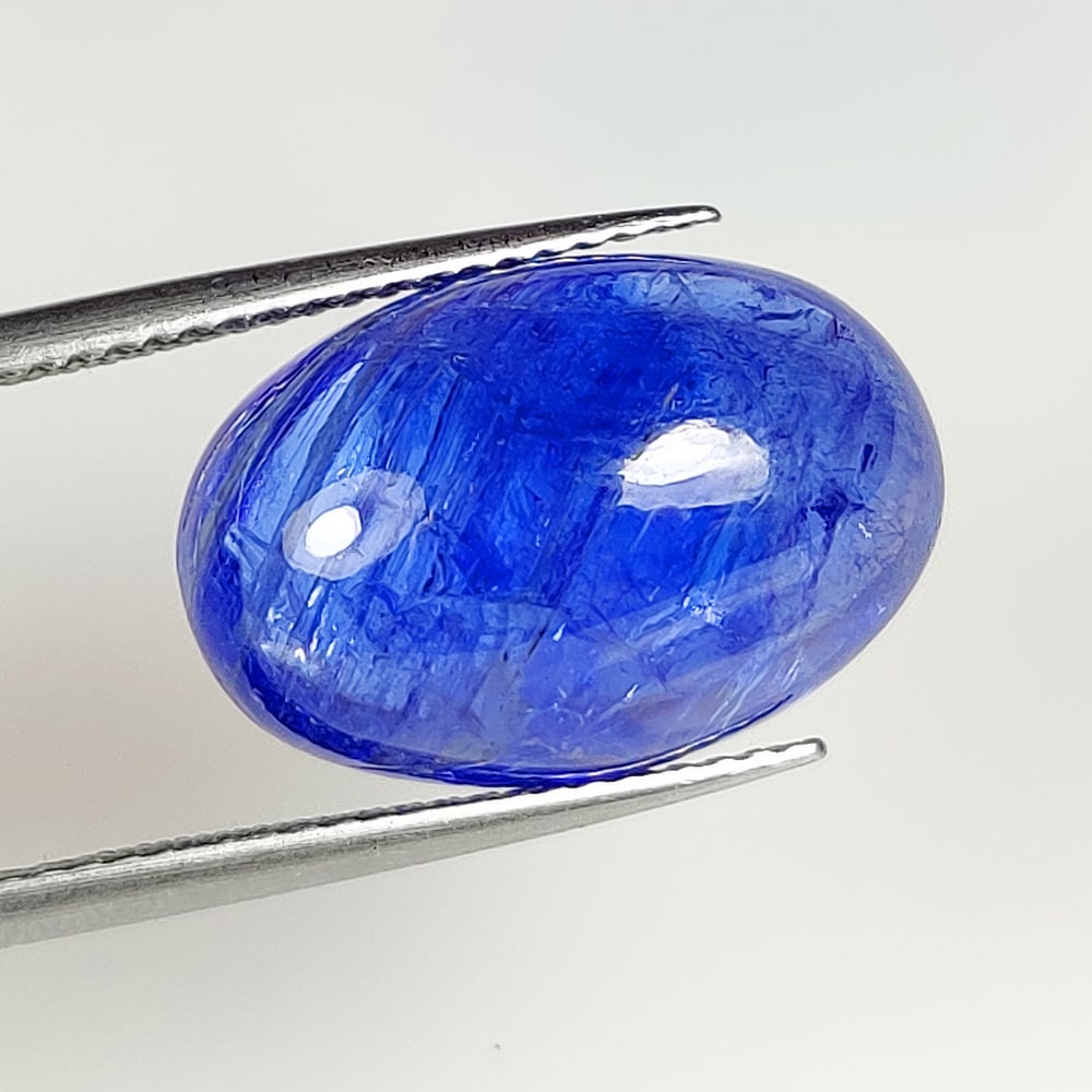 12.95 Ct Natural Tanzanite Oval Cab (1 of 2)
