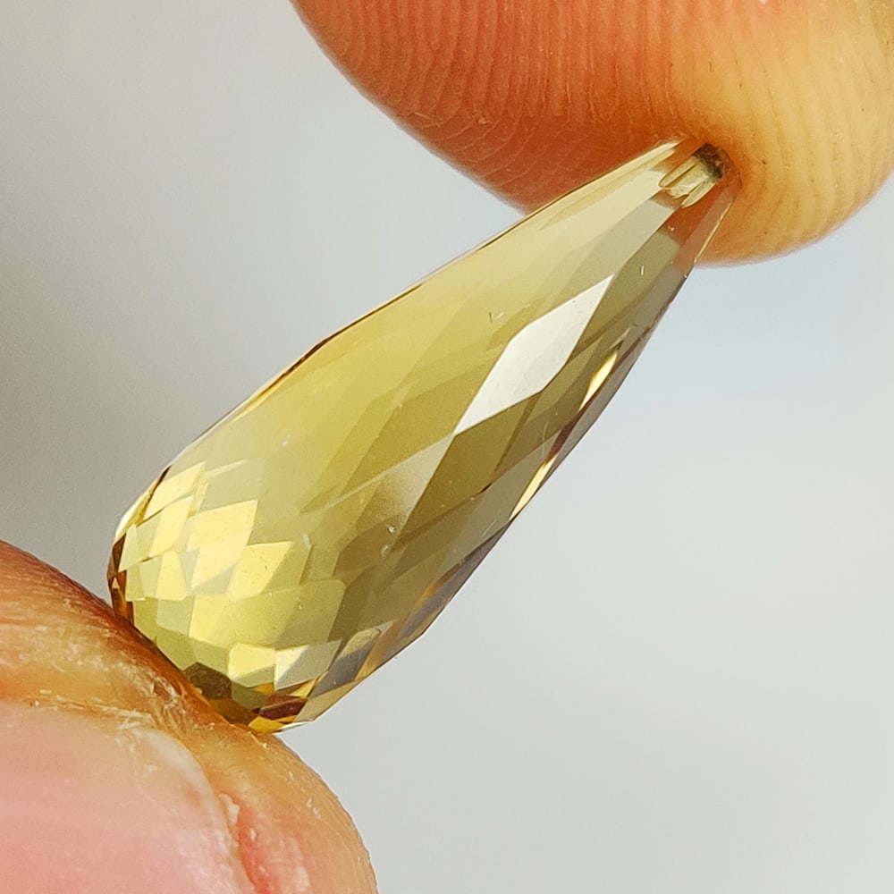 5.23 Ct Natural Yellow Citrine Pear Drop: Weight - 5.23 Ct / Size - 17.70 x 7.00 x 7.00 mm / Shape - Pear Drop / Color - Yellow / Clarity - VVS / Origin - Brazil / Treatment - Heated