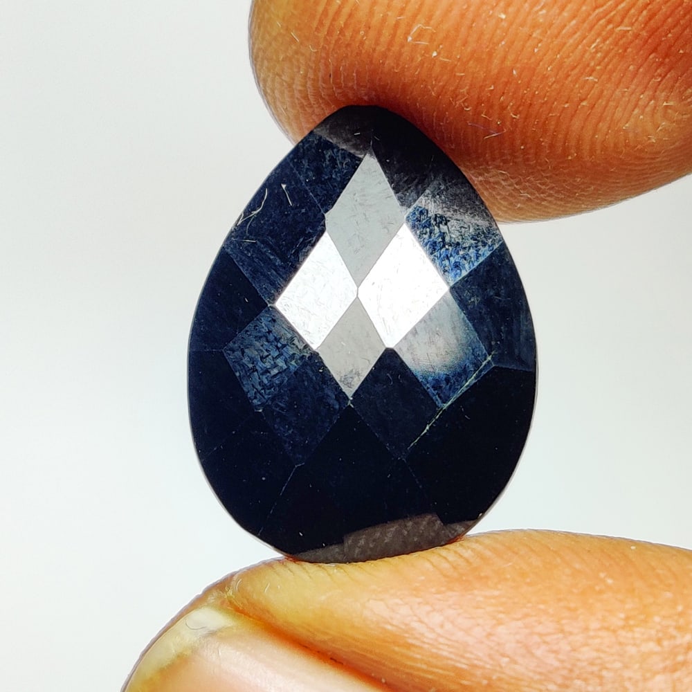 6.86 Ct Natural Black Onyx Pear Cut: Weight - 6.86 Ct / Dimensions -16.00 x 11.90 x 4.50 mm / Shape - Pear Cut / Clarity - Opaque / Origin - Brazil / Comments - None