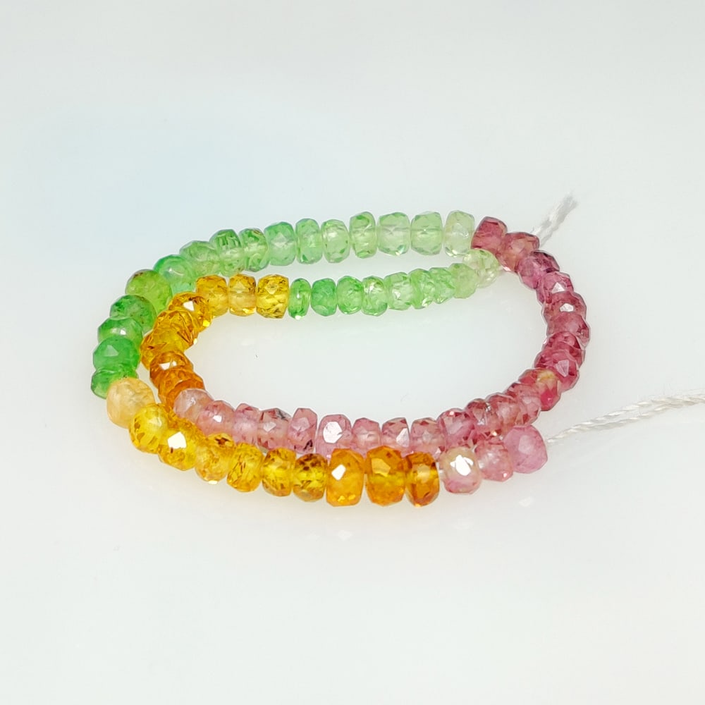 8.09 Ct Natural Multicolor Garnet & Tourmaline Round cut Beads: Weight - 8.09 Ct / Size- 2.50 - 2.90 mm / 68 Pc's / Shape - Round Cut Beads / Clarity - SI / Origin - Sri Lanka / Treatment - Standard Heated