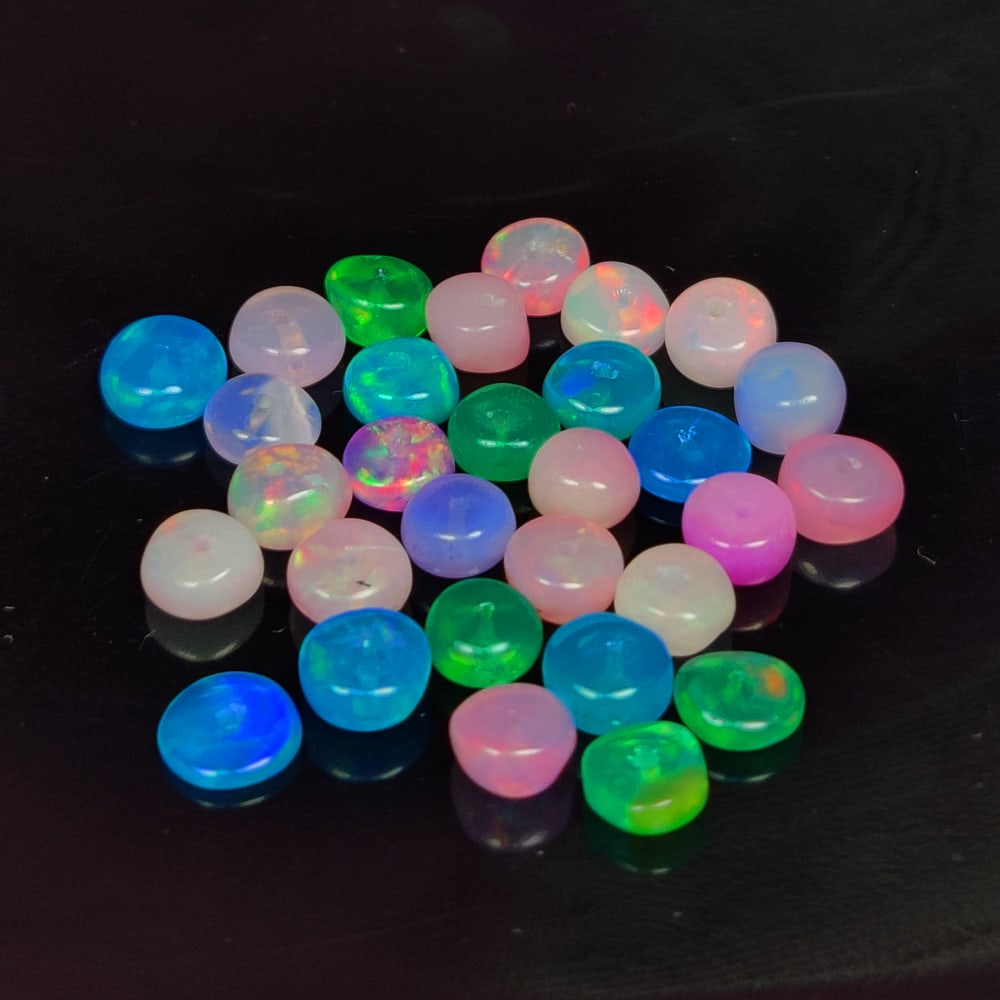9.34 Ct Natural Multicolor Fire Opal Round Beads: Weight - 9.34 Ct / Size - 4.70 - 5.00 mm / 30 Pc's / Shape - Round Beads / Color - Multicolor / Clarity - Translucent / Origin - Ethiopia / Treatment - Color Heated