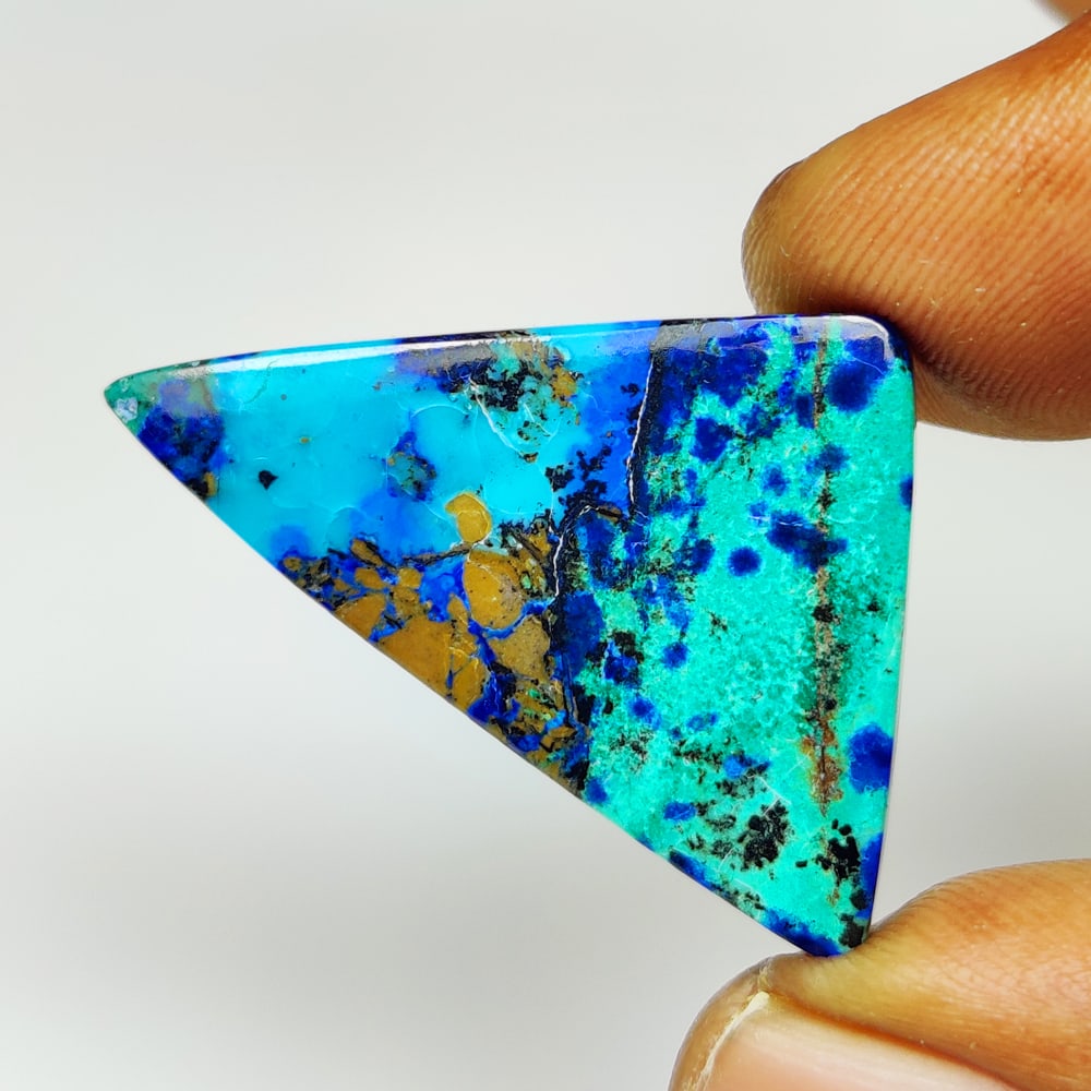 28.29 Ct Natural Tibetian Blue Turquoise Trillion Cab: Weight - 28.29 Ct / Dimensions - 39.00 x 19.90 x 6.10 mm / Good Color / Trillion Cab - Ready for Jewellery Setting / Origin - Tibet / Comments - None