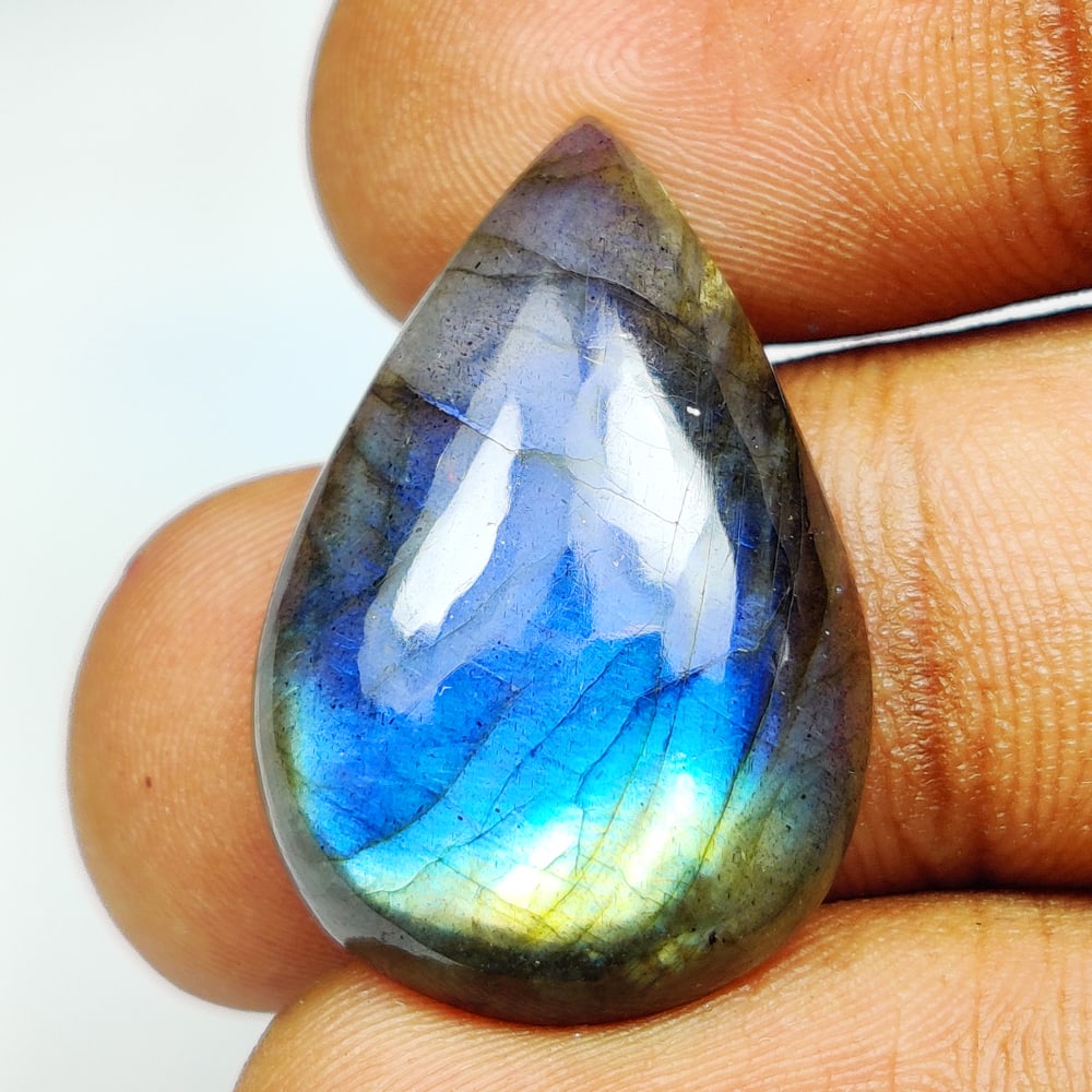 17.72 Ct Natural Labradorite Pear Cab: Weight - 17.72 Ct / Size -27.00 x 17.60 x 5.70 mm / Shape - Pear Cab / Clarity - Opaque / Origin - Africa / Treatment - None