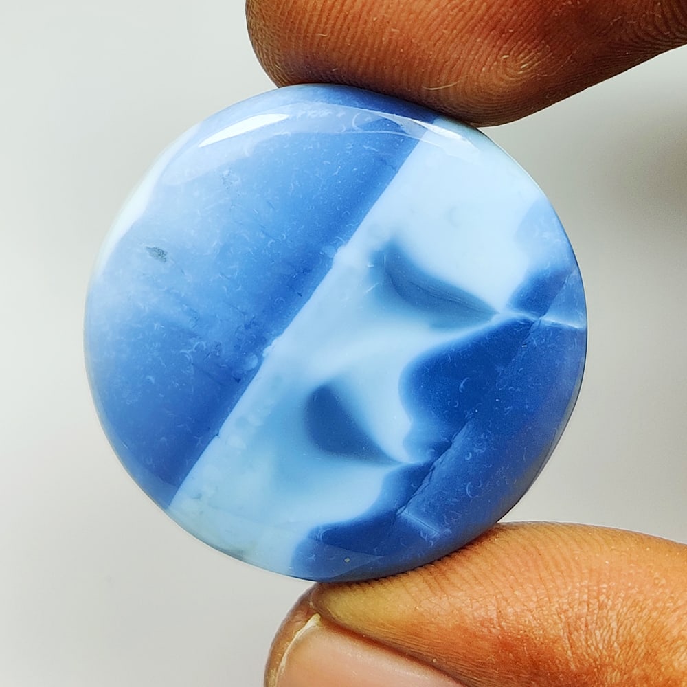21.74 Ct Natural Peruvian Blue Opal Round cab (1 of 2)