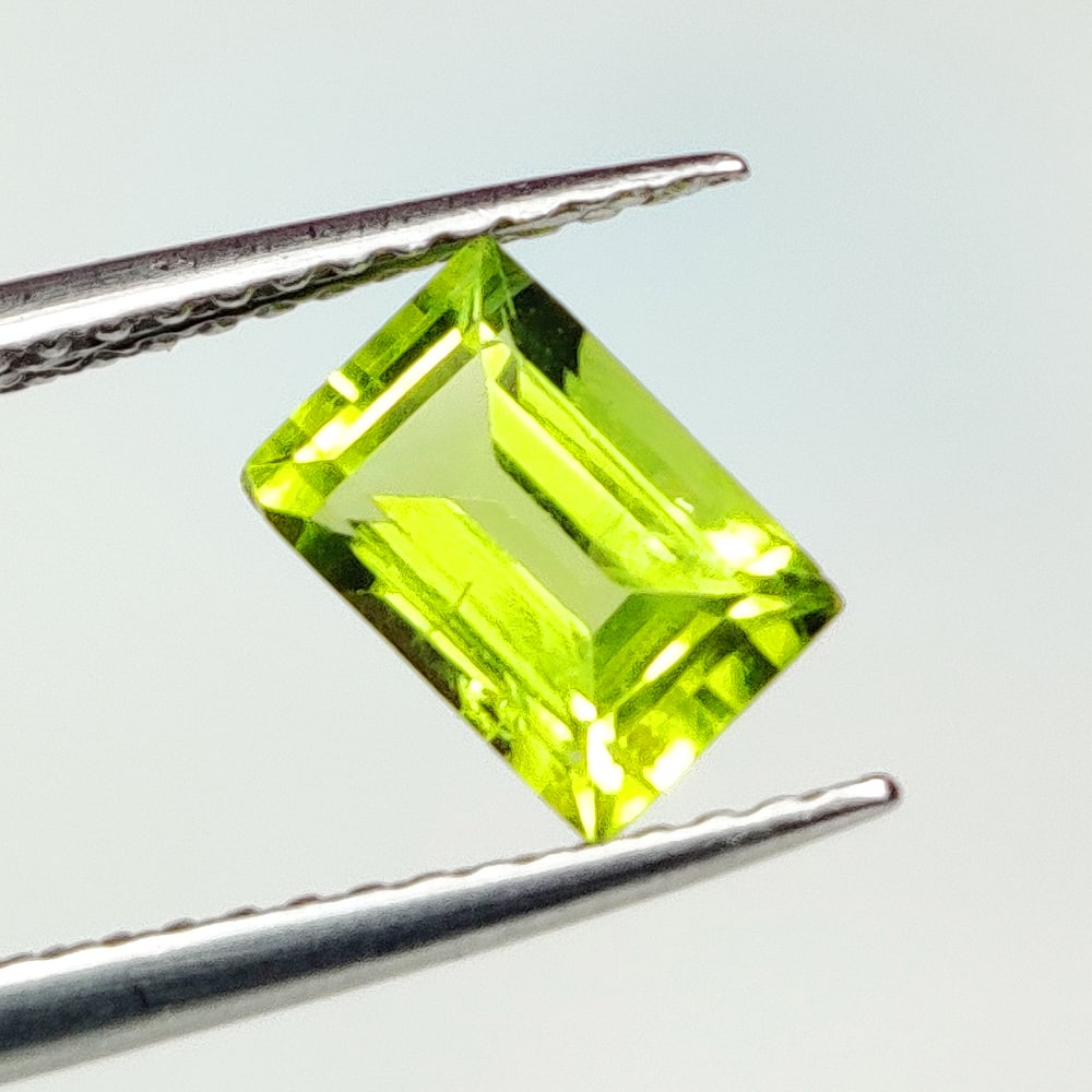 1.10 Ct Natural Green Peridot Rectangle Cut: Weight - 1.10 Ct / Dimensions - 7.20 x 5.00 x 3.50 mm / Shape - Rectangle Cut / Color - Green / Clarity - VVS / Origin - Pakistan / Treatment - None