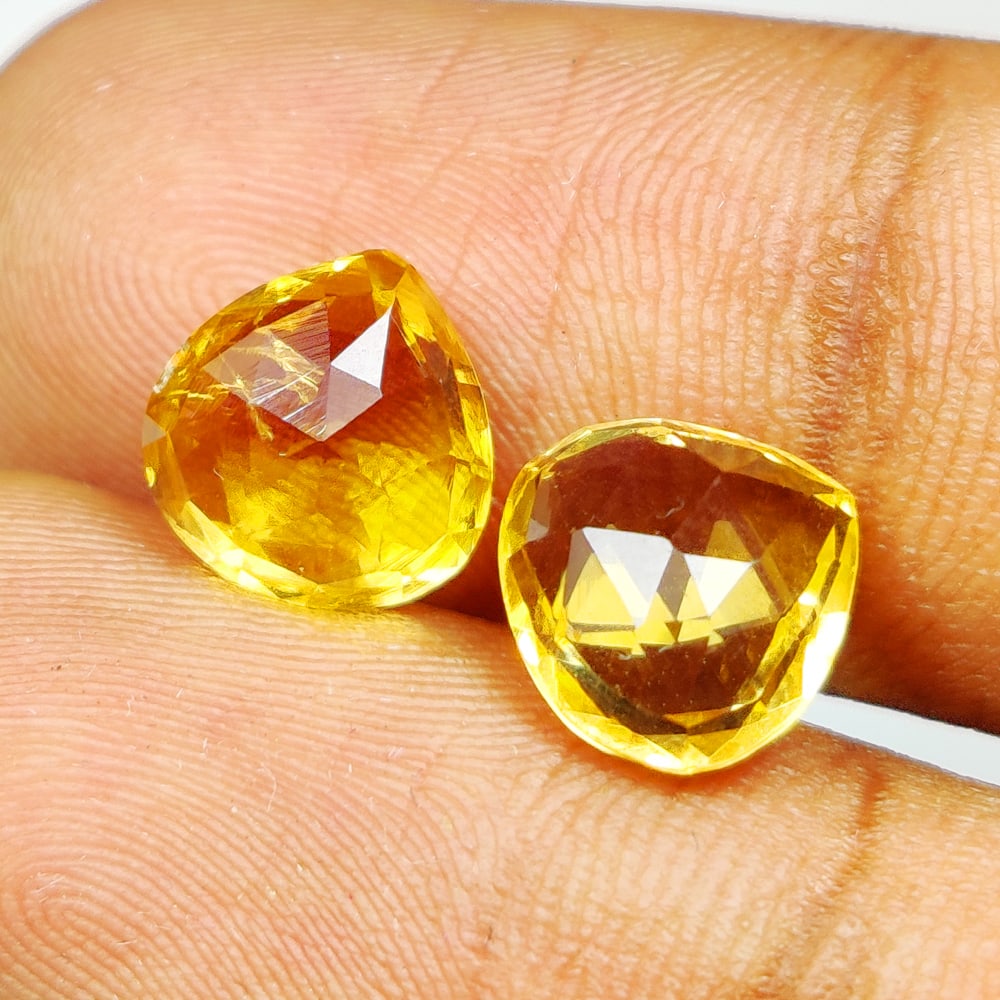 4.98 Ct Natural Yellow Citrine Pear Cut Pair: Weight - 4.98 Ct / Size -8.80 x 8.60 x 5.90 mm / 2 Pc's / Shape - Pear Cut / Color - Yellow / Clarity - VVS / Origin - Brazil / Treatment - Heated