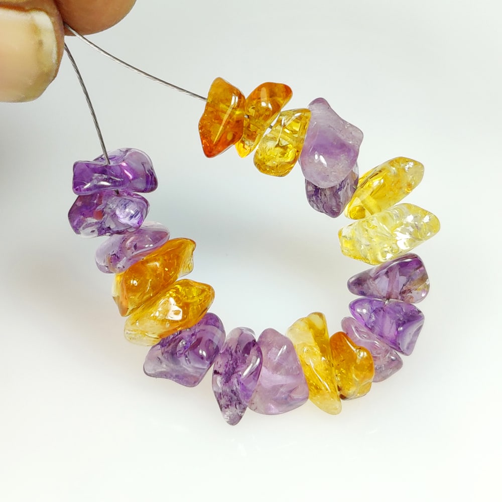 25.54 Ct Natural Citrine & Amethyst Unshaped beads: Weight - 25.54 Ct / Size - 6.60 - 7.90 mm / 20 Pc's / Shape - Unshaped beads / Color - Mixed / Clarity - VVS / Origin - Brazil / Treatment - Heated