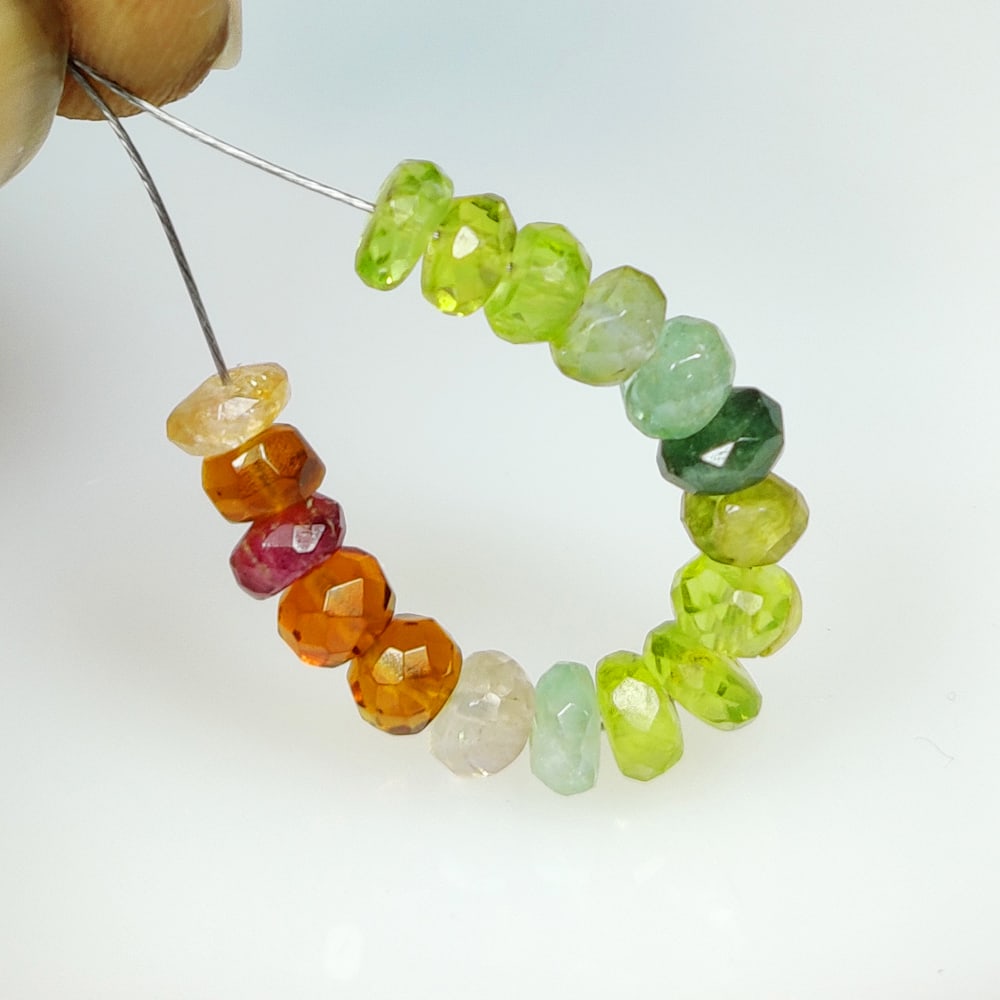 7.38 Ct Natural Peridot , Garnet Mixed Round Cut beads: Weight - 7.38 Ct / Size - 4.10 - 4.40 mm / 17 Pc's / Shape - Round Cut beads / Color - Mixed / Clarity - VVS / Origin - Brazil / Treatment - None