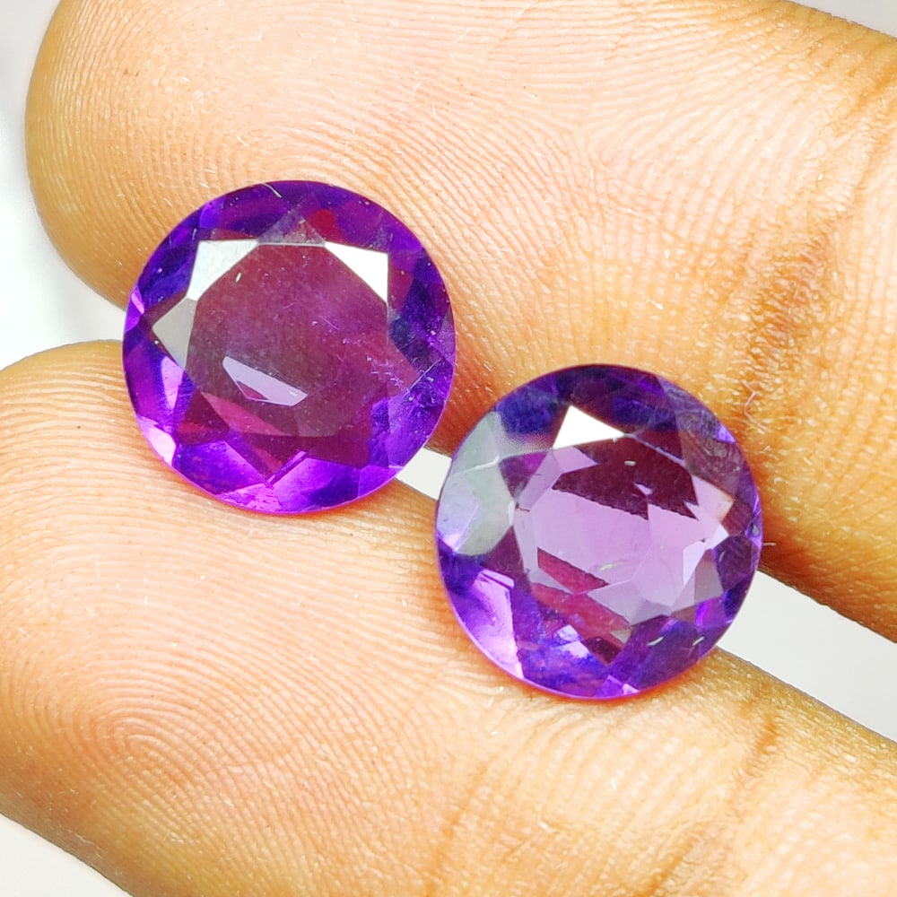 5.10 Ct Natural Purple Amethyst Round Cut Pair: Weight - 5.10 Ct / Dimensions -10.00 x 10.00 x 3.80 mm / 2 Pc's / Shape - Round Cut / Color - Purple / Clarity - VVS / Origin -Brazil / Treatment - Heated