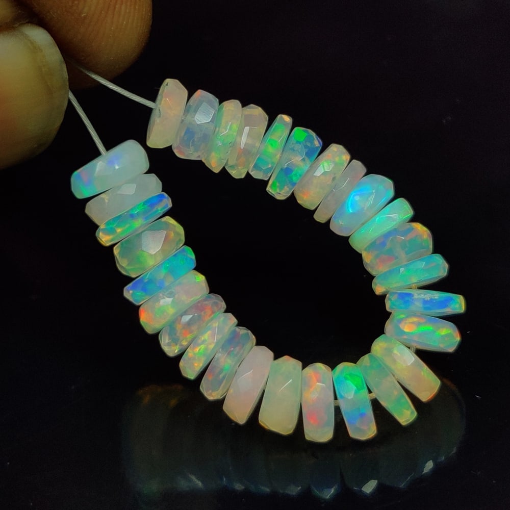 7.46 Ct Natural Multi-Color Welo Opal Round Beads: Weight - 7.46 Ct / Size - 4.90 - 5.10 mm / 29 Pc's / Shape - Round Beads / Color - Multicolor / Clarity - Translucent / Origin - Ethiopia / Treatment - None