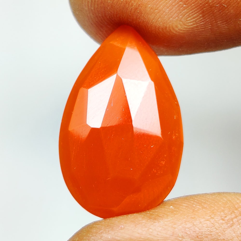 7.86 Ct Natural Orange Carnelian Pear cut: Weight - 7.86 Ct / Dimensions - 23.00 x 13.90 x 4.20 mm / Shape & Cut - Pear Cut / Transparency - Semi - Opaque / Origin - Brazil