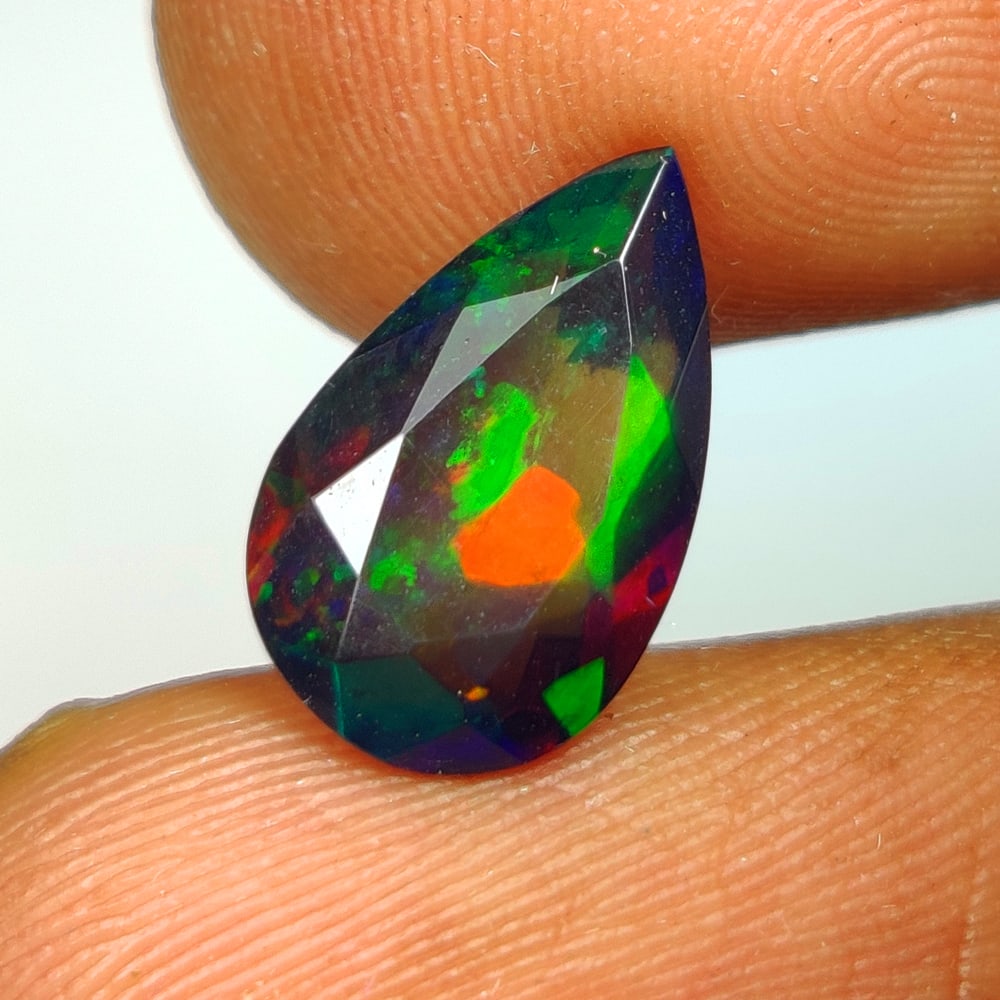 1.34 Ct Natural Black Fire Opal Pear Cut (1 of 2)