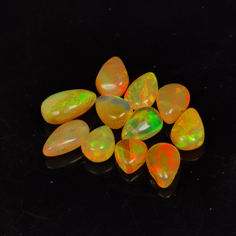 5.16 Ct Natural Multi-Color Welo Opal Pear Beads (1 of 2)
